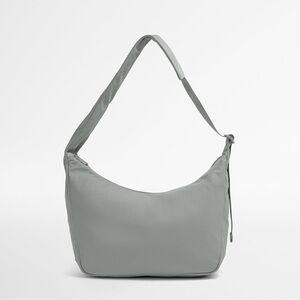 Away small featherlight crossbody